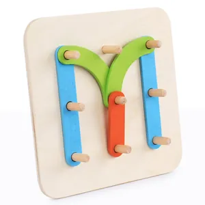 Wooden peg board puzzle with colorful blocks forming letter M for toddler education