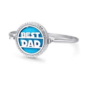 Detail of Best Dad aromatherapy diffuser bracelet with blue pad and sparkling crystals