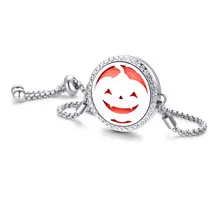 Detail of silver pumpkin locket bracelet with rhinestones and adjustable slider chain