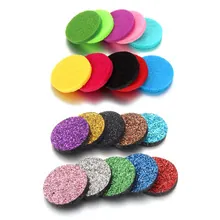 Macro shot of colorful felt pads for essential oil diffuser jewelry in various vibrant colors