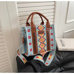 Close-up of ethnic tote bag showing pattern detail and detachable wide shoulder strap