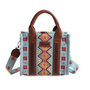 Ethnic style canvas tote bag with geometric patterns and braided leather straps