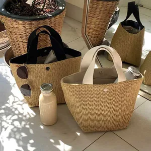 Detailed straw woven bucket bags with metal snap closure and soft fabric lining