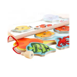 Magnetic wooden fishing toy set with colorful marine creatures and a smooth wooden rod