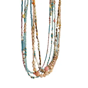 Handmade bohemian multilayer beaded necklace with strawberry quartz and titanium steel