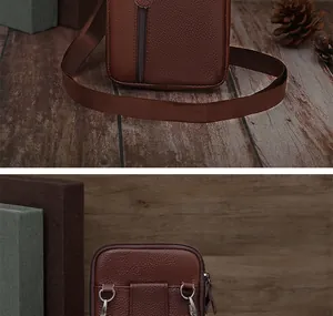 Detail of dark brown leather waist bag with lychee texture and adjustable shoulder strap