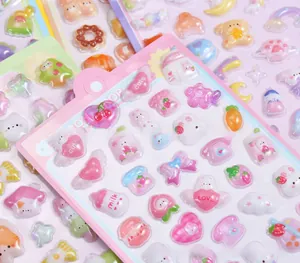 Macro detail of 3D embossed cartoon stickers with cute bear and strawberry patterns