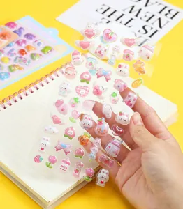 Detailed view of 3D embossed cartoon stickers with bunny and peach patterns