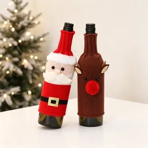 Christmas knitted wine bottle covers featuring Santa Claus and reindeer holiday designs