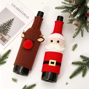 Christmas knitted wine bottle covers featuring Santa Claus and reindeer holiday designs