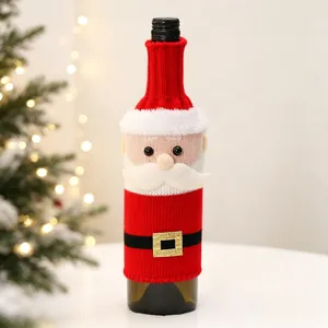 Close-up of knitted Santa wine bottle cover with soft plush beard and belt detail