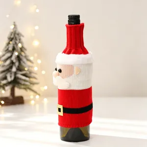 Detailed knitted Christmas Santa wine bottle cover with white beard and gold buckle