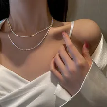 Close-up of elegant silver double-layer clavicle necklace with sparkling crystal rhinestones