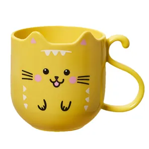 Cute yellow cartoon cat mouthwash cup with cat tail handle and ear-shaped rim