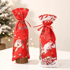 Christmas Santa and gnome wine bottle bags with red drawstring on a festive background