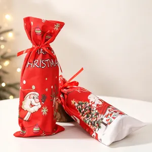 Christmas Santa fabric wine bottle bags with festive prints and drawstring closures