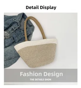 Detail view of woven tote bag with contrast stitching and durable rope handles