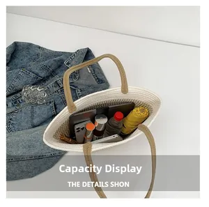 Top view showing large capacity of the woven tote bag with daily essentials inside