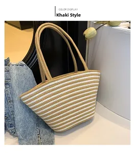 Detail view of khaki and white striped woven cotton tote bag with natural texture