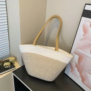 Striped crochet tote bag with natural contrast cotton rope handles for summer beach use