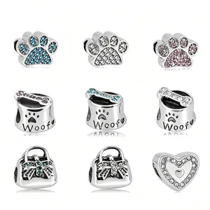 Set de 9 abalorios de acero inoxidable con huellas de mascotas y corazones para pulseras DIY