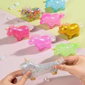 Macro shot of colorful unicorn squishy stress toys with glitter filling and elastic texture