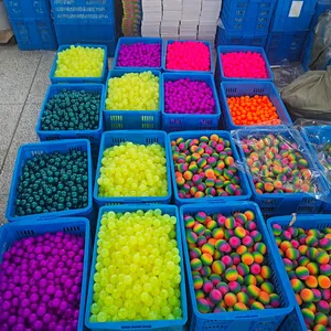 Assorted colorful TPR squishy stress relief toys in bulk industrial storage crates