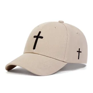 Classic khaki cotton baseball cap for kids with black cross embroidery on white background