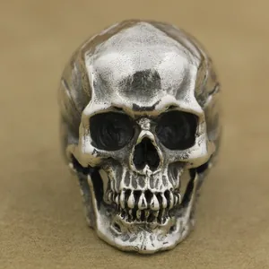 Vintage gothic skull ring in oxidized silver finish with detailed punk rock craftsmanship