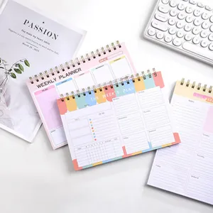 Planificador semanal en colores macarrón con espiral metálica y listas de tareas diarias
