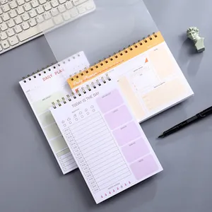 Detalle de páginas de agenda A5 con horario y seguimiento de hidratación diaria