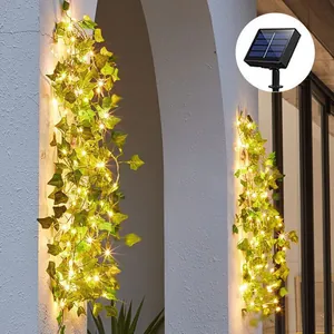 Solar ivy string lights with warm LED beads and solar panel detail for patio decor