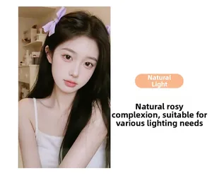 Close-up of portable LED selfie ring light showing natural skin tone lighting effect
