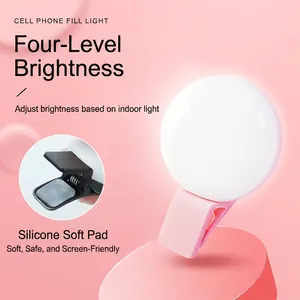 Pink LED clip-on selfie light with 4 brightness levels and protective silicone pads