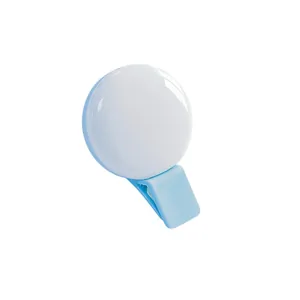 Portable mini LED clip-on selfie ring light for smartphones and laptops in light blue