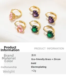 Detail of 18K gold plated heart earrings with pink, purple and green zircon stones