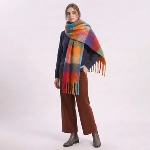 Detailed close-up showing soft mohair texture and colorful plaid pattern on long shawl scarf