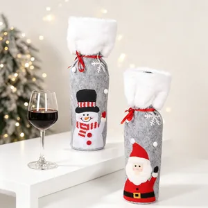 Copribottiglie di vino natalizie con motivi di Babbo Natale e pupazzo di neve