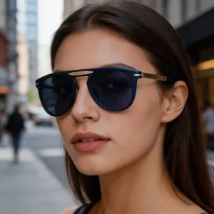 Detail shot of vintage folding sunglasses with deep blue frames and gold metal accents