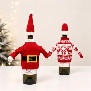 Knitted Christmas wine bottle covers featuring Santa suit and reindeer snowflake patterns