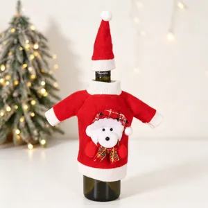 Detail of Christmas wine bottle cover with 3D plush bear and knit mini sweater