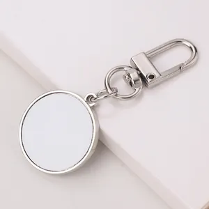 Detailed view of a silver sublimation keychain with lobster clasp and round DIY blank insert
