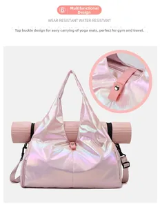 Iridescent fitness bag with top buckle straps securing a yoga mat for easy travel