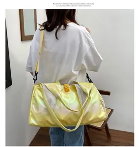 Close-up of vibrant iridescent yellow laser travel bag with durable metal zippers