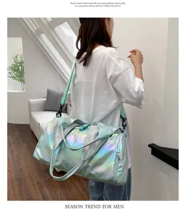 Detail view of colorful laser fabric texture and shoulder strap on fitness bag