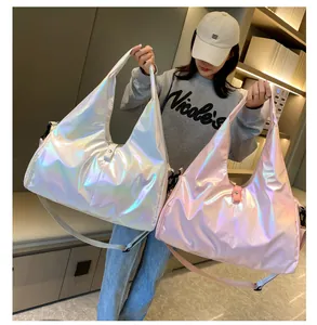 Detail showing two holographic laser fitness bags with metallic finish and long straps