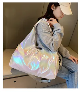 Close-up of holographic laser tote bag showing colorful iridescent texture and wide straps