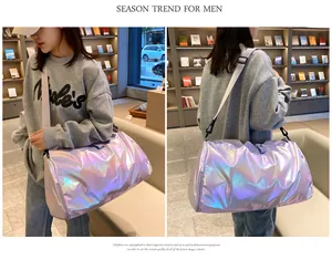 Detail of holographic gym bag showing laser finish texture and detachable shoulder strap