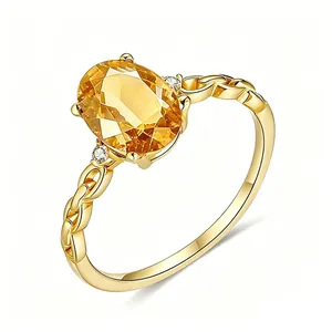 925 silver 18K gold ring with large oval yellow gemstone and woven rope band detail