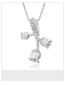 Detailed view of S925 sterling silver lily of the valley pendant with sparkling crystals